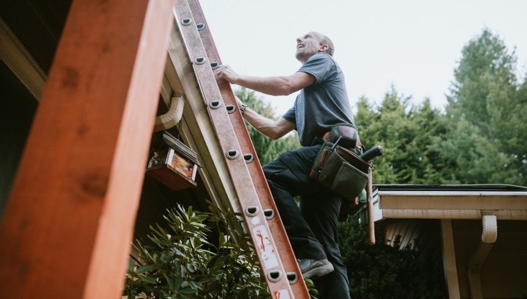 Contractor Inspecting Roof